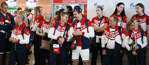 Russian Olympic team departs for Rio de Janeiro - Sputnik International