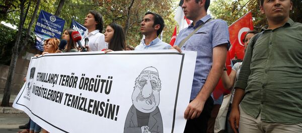 Pro-nationalist university students during a protest against U.S.-based cleric Fethullah Gulen and his followers during a demonstration in Ankara, on July 21, 2016 Pro-nationalist university students during a protest against U.S.-based cleric Fethullah Gulen and his followers during a demonstration in Ankara, on July 21, 2016 - Sputnik International