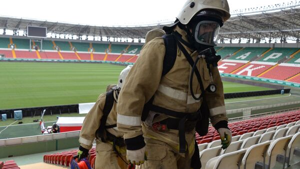 Emergencies Ministry employees during a fire and tactical exercise as part of the preparation for the 2018 FIFA World Cup at the Akhmat Arena stadium in Grozny - Sputnik International