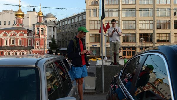 Pokemon Go players in Ilyinsky Park, Moscow - Sputnik International
