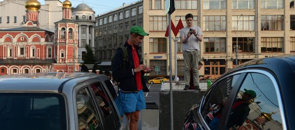 Pokemon Go players in Ilyinsky Park, Moscow Pokemon Go players in Ilyinsky Park, Moscow - Sputnik International