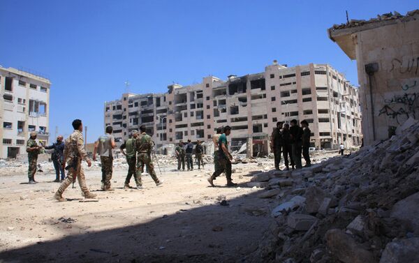Syrian army soldiers patrol the area around the entrance of Bani Zeid after taking control of the previously rebel-held district of Leramun, on the northwest outskirts of Aleppo, on July 28, 2016 Syrian army soldiers patrol the area around the entrance of Bani Zeid after taking control of the previously rebel-held district of Leramun, on the northwest outskirts of Aleppo, on July 28, 2016 - Sputnik International