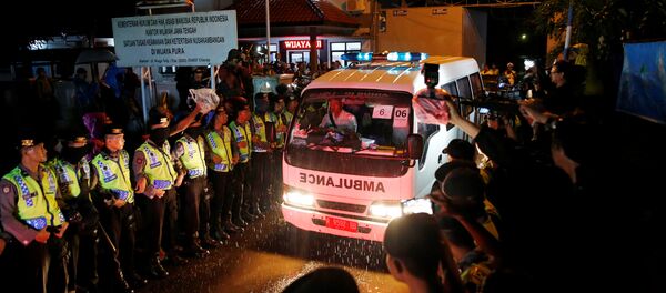 An ambulance carrying the remains of an executed prisoner leaves the port of the prison island of Nusa Kambangan island, in Cilacap, Central Java, Indonesia July 29, 2016 - Sputnik International