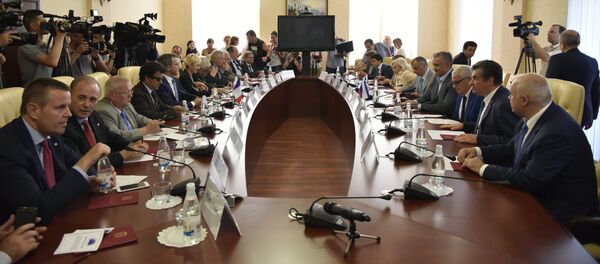 French MPs meet with Head of the Republic of Crimea Sergei Aksyonov, fourth right at the table, in Simferopol - Sputnik International