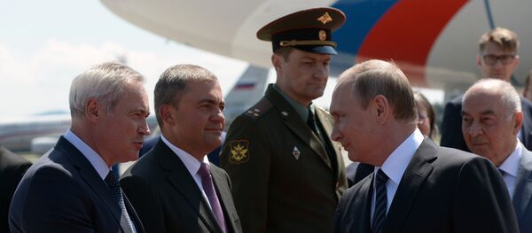 July 30, 2016. Russian President Vladimir Putin, second right, is welcomed in Ljubljana Joze Pucnik Airport - Sputnik International