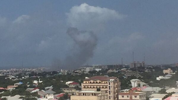 Two loud explosions with ensuing heard near the Criminal Investigation Department headquarters in Somalia's capital Mogadishu, witness reports - Sputnik International