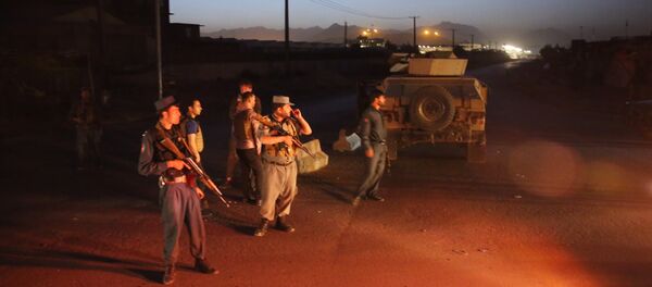 Afghan police black a road leading to the site of an explosion, in Kabul, Afghanistan Monday, Aug. 1, 2016. - Sputnik International