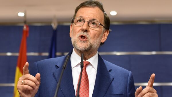 Spain's interim Prime Minister Mariano Rajoy gives a press conference at the Spanish parliament in Madrid - Sputnik International