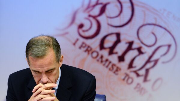 Governor of the Bank of England Mark Carney is pictured as he addresses a quarterly inflation report press conference at the Bank of England in London, on November 12, 2014.  - Sputnik International