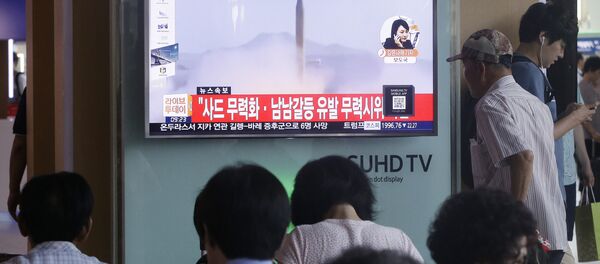 South Koreans watch a TV news program airing file footage of a North Korean rocket launch at the Seoul Railway Station in Seoul, South Korea, Wednesday, Aug. 3, 2016. South Koreans watch a TV news program airing file footage of a North Korean rocket launch at the Seoul Railway Station in Seoul, South Korea, Wednesday, Aug. 3, 2016. - Sputnik International