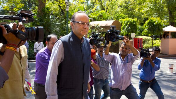 Indian Finance Minister Arun Jaitley arrives at the parliament house in New Delhi, India, Aug. 3, 2017. The government on Wednesday is likely to present the goods and services tax or GST bill in the upper house of the parliament, which if enacted will replace central and state taxes with a single GST creating a national market for the country. The reform is expected to raise India's GDP by up to 1.7 percent. - Sputnik International
