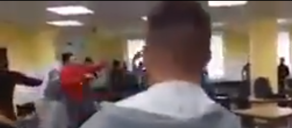 Mass brawl between refugees in registry center in Germany (video screenshot) Mass brawl between refugees in registry center in Germany (video screenshot) - Sputnik International