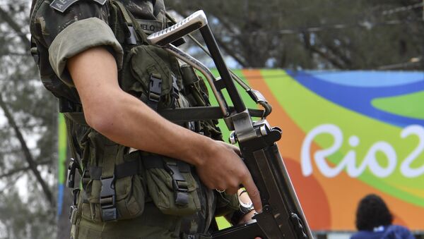 A Brasilian soldier stands guard near the Riocentro complex in Rio de Janeiro, on August 3, 2016, ahead of the Rio 2016 Olympic Games - Sputnik International