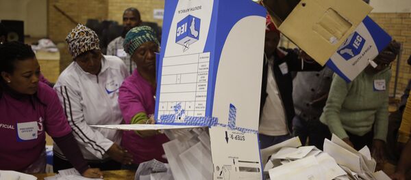 Election officials start the ballot counting process at a polling station during municipal elections in Manenberg on the outskirts of Cape Town, South Africa, Wednesday, Aug. 3, 2016 Election officials start the ballot counting process at a polling station during municipal elections in Manenberg on the outskirts of Cape Town, South Africa, Wednesday, Aug. 3, 2016 - Sputnik International