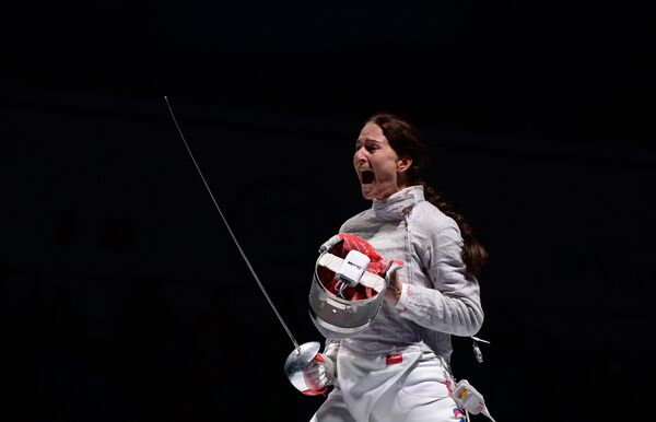 Sofya Velikaya (Russia) in the women's team sabre event final at the 2015 world championships in Moscow Sofya Velikaya (Russia) in the women's team sabre event final at the 2015 world championships in Moscow - Sputnik International