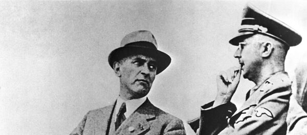 IG Farbenindustrie chief engineer M. Faust (L) talks with Reichsfuhrer of the SS Heinrich Himmler (R). IG Farbenindustrie chief engineer M. Faust (L) talks with Reichsfuhrer of the SS Heinrich Himmler (R). - Sputnik International