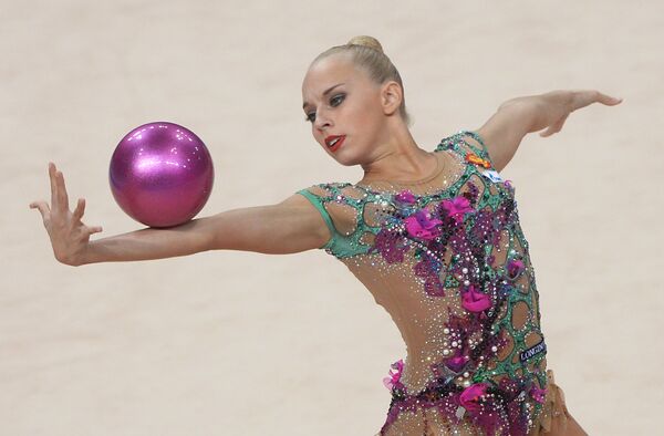 Russia's Yana Kudryavtseva performs her routine during individual ball finals at the 34th Rhythmic Gymnastics World Championships in Stuttgart, Germany Russia's Yana Kudryavtseva performs her routine during individual ball finals at the 34th Rhythmic Gymnastics World Championships in Stuttgart, Germany - Sputnik International