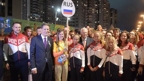 Flag raising ceremony in Olympic Village - Sputnik International