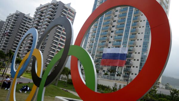 A Russian flag at the Olympic village in Rio de Janeiro - Sputnik International