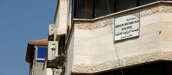 Christian charity World Vision organization is seen at a building housing the organisation's office in Gaza City August 4, 2016 Christian charity World Vision organization is seen at a building housing the organisation's office in Gaza City August 4, 2016 - Sputnik International