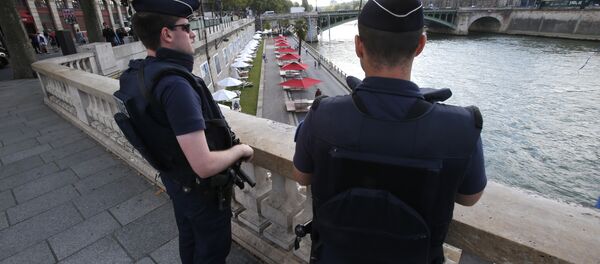 French police officers patrol over the Seine river at Paris Plage (Paris Beach) Friday, Aug. 5, 2016 in Paris French police officers patrol over the Seine river at Paris Plage (Paris Beach) Friday, Aug. 5, 2016 in Paris - Sputnik International
