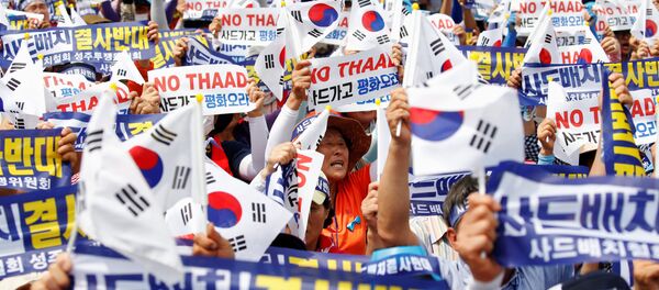 Seoungju residents chant slogans during a protest against the government's decision on deploying a U.S. THAAD anti-missile defense unit in Seongju, in Seoul, South Korea, July 21, 2016 Seoungju residents chant slogans during a protest against the government's decision on deploying a U.S. THAAD anti-missile defense unit in Seongju, in Seoul, South Korea, July 21, 2016 - Sputnik International
