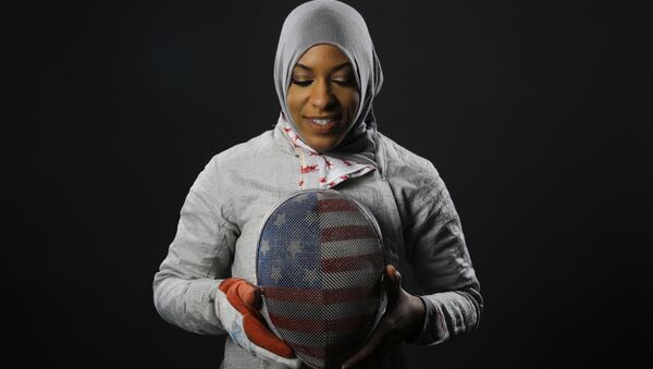 In this March 8, 2016, file photo, Fencer Ibtihaj Muhammad poses for photos at the 2016 Olympic Team USA media summit in Beverly Hills, Calif. - Sputnik International