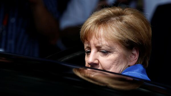 German Chancellor Angela Merkel leaves a news conference in Berlin, Germany (File) - Sputnik International