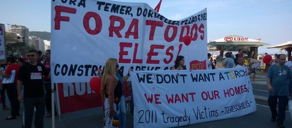 Residents of Rio de Janeiro protest against interim president Michel Temer, political upheaval, corruption and the cost of the Rio 2016 Olympics Games - Sputnik International