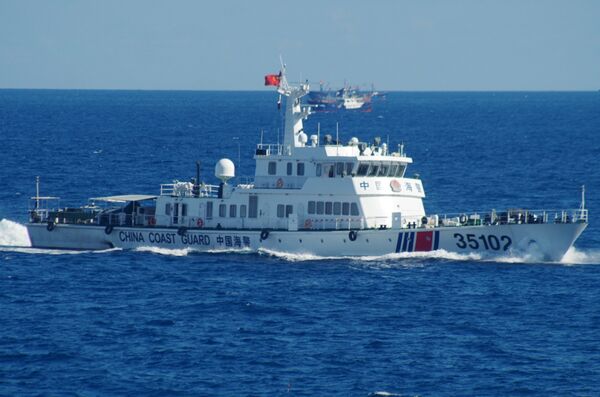 In this photo released by the 11th Regional Coast Guard Headquarters of Japan, a Chinese coast guard vessel sails near disputed East China Sea islands Saturday, Aug. 6, 2016 In this photo released by the 11th Regional Coast Guard Headquarters of Japan, a Chinese coast guard vessel sails near disputed East China Sea islands Saturday, Aug. 6, 2016 - Sputnik International