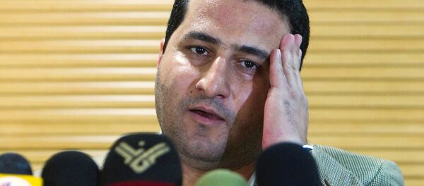 Iranian scientist Shahram Amiri speaks to journalists as he arrives at the Imam Khomini Airport in Tehran, July 15, 2010 Iranian scientist Shahram Amiri speaks to journalists as he arrives at the Imam Khomini Airport in Tehran, July 15, 2010 - Sputnik International