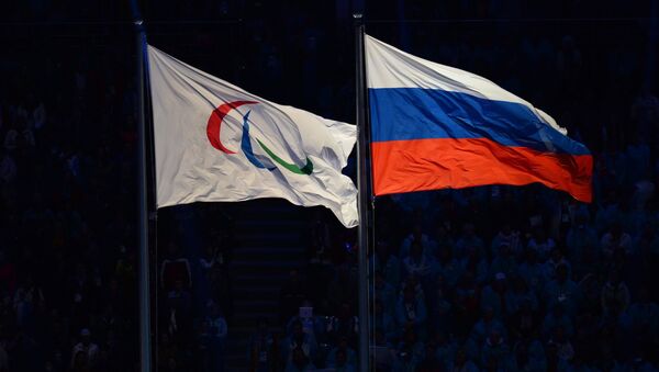 The Paralympic flag and the Russian national flag. (File) - Sputnik International