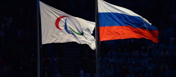 The Paralympic flag and the Russian national flag. (File) - Sputnik International