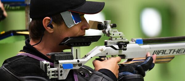 Russia's Vladimir Maslennikov competes during the 10m Air Rifle Men's at the Olympic Shooting Centre in Rio de Janeiro during the Rio 2016 Olympic Games Russia's Vladimir Maslennikov competes during the 10m Air Rifle Men's at the Olympic Shooting Centre in Rio de Janeiro during the Rio 2016 Olympic Games - Sputnik International