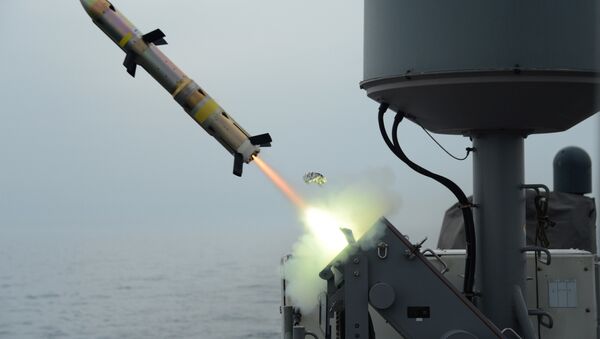 In this photo released on March 20, 2014 by the U.S. Navy, patrol coastal ship USS Typhoon launches a surface-to-surface missile during Griffin missile exercise to guard against small boat threats in the U.S. - Sputnik International