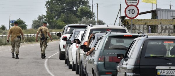 Cars at Jankoi border crossing point on Russia-Ukraine border Cars at Jankoi border crossing point on Russia-Ukraine border - Sputnik International