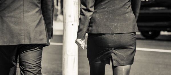 Man and woman dressed in suits Man and woman dressed in suits - Sputnik International