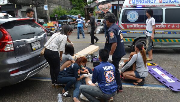 Injured people receive first aid after a bomb exploded on August 11, 2016 in Trang, Thailand. Picture taken August 11, 2016 - Sputnik International