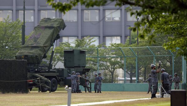 Japan Self-Defense Force members set up a PAC-3 Patriot missile unit in case of a North Korean rocket launch at the Defense Ministry in Tokyo, Tuesday, June 21, 2016 - Sputnik International