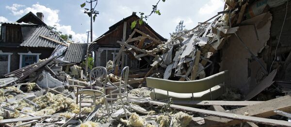Houses destroyed in shelling of Petrovsky District in Donetsk Houses destroyed in shelling of Petrovsky District in Donetsk - Sputnik International