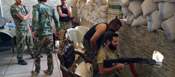 Syrian army troops during the assault on the artillery school in the south-east of Aleppo, Syria - Sputnik International