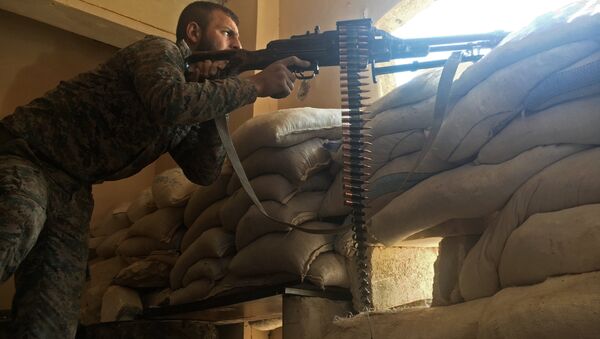 A Syrian army soldier during the assault on the artillery school in the south-east of Aleppo, Syria - Sputnik International