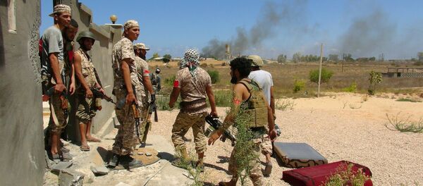 Libyan forces allied with the U.N.-backed government prepare to capture university buildings during a battle with IS fighters in Sirte, Libya, August 10, 2016 Libyan forces allied with the U.N.-backed government prepare to capture university buildings during a battle with IS fighters in Sirte, Libya, August 10, 2016 - Sputnik International