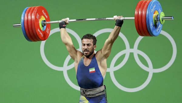 2016 Rio Olympics - Weightlifting - Final - Men's 85kg - Riocentro - Pavilion 2 - Rio de Janeiro, Brazil - 12/08/2016. Kianoush Rostami (IRI) of Iran competes. - Sputnik International