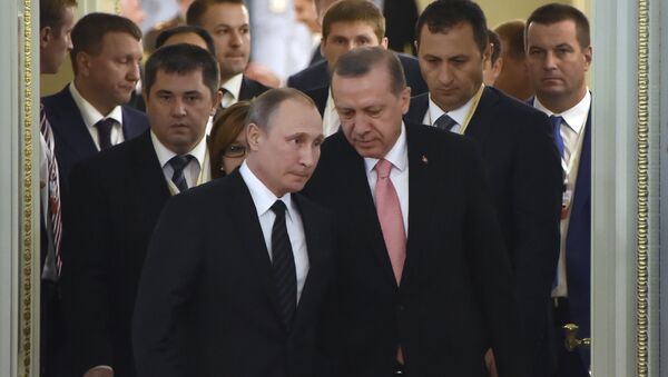 Russian President Vladimir Putin (C-L) and his Turkish counterpart Recep Tayyip Erdogan (C-R) enter a hall to start their meeting with Russian and Turkish entrepreneurs in Konstantinovsky Palace outside Saint Petersburg on August 9, 2016 - Sputnik International
