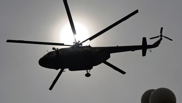 This file photo taken on March 23, 2014 shows a Pakistani Air Force Mi-17 helicopter flies over the Presidential Palace during a parade marking the country's National Day in Islamabad - Sputnik International