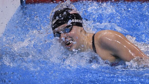 USA's Katie Ledecky competes to break the world record in the Women's 800m Freestyle Final during the swimming event at the Rio 2016 Olympic Games at the Olympic Aquatics Stadium in Rio de Janeiro on August 12, 2016 - Sputnik International