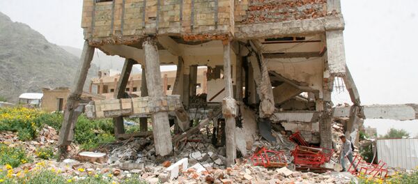 A man walks on the rubble of a school destroyed by a Saudi-led air strike in the southwestern city of Taiz, Yemen July 27, 2016 A man walks on the rubble of a school destroyed by a Saudi-led air strike in the southwestern city of Taiz, Yemen July 27, 2016 - Sputnik International