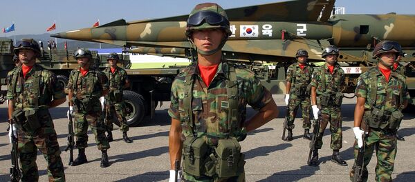 South Korean artillery soldiers stand in front of the Hyunmoo Surface to Surface Missile during Armed Forces Day rehearsal, at the Seongnam military airport, outskirts of Seoul (File) South Korean artillery soldiers stand in front of the Hyunmoo Surface to Surface Missile during Armed Forces Day rehearsal, at the Seongnam military airport, outskirts of Seoul (File) - Sputnik International