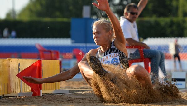 Darya Klishina competes in the long jump event at the Russian Track and Field Athletics Championship in Cheboksary. - Sputnik International